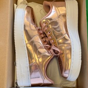 Nike Women's Sneakers in Metallic Rose Gold and White